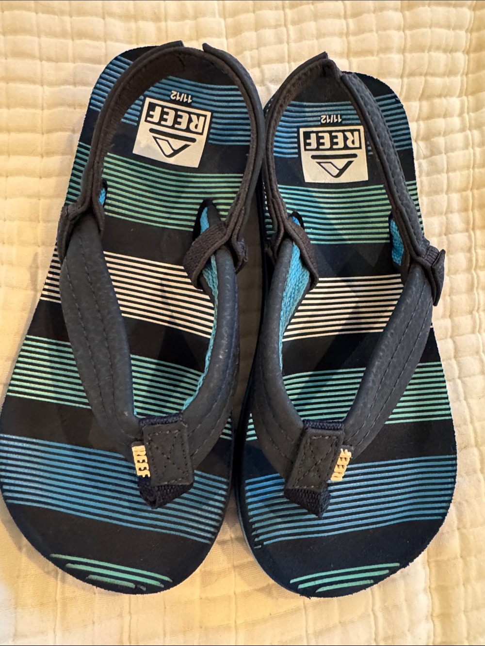 Reef Boys Navy Flip Flops with Teal & White Stripes